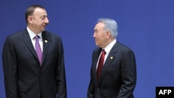 Azerbaijani President Ilham Aliyev (left) and his Kazakh counterpart, Nursultan Nazarbaev, are two leaders of Turkic-speaking, former Soviet nations who will be nervously monitoring relations between Moscow and Ankara in the coming months. 