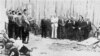 Leaders of the Jewish community of the town of Balti (right) are seen before their execution on July 15, 1941. German soldiers stand at left. (Photo: Matatias Carp, Cartea Neagra - Bucharest, 1947 - Volume III) 