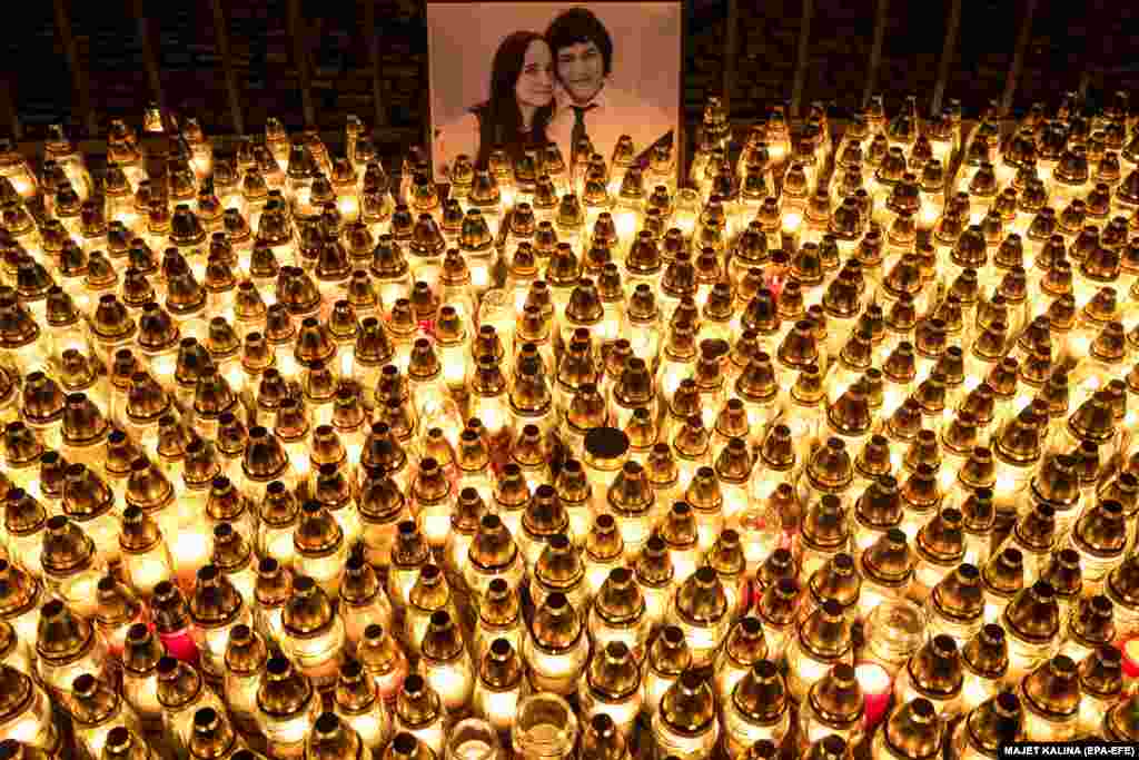 Candles lit in memory of murdered Slovak journalist Jan Kuciak are laid out in front of government buildings in the capital, Bratislava, on February 28. The bodies of Kuciak and his girlfriend Martina Kusnirova were found in their home in Velka Maca, east of the capital. They had both been shot. The 27-year-old reporter was working for the Slovak news website Aktuality.sk and specialized in reporting on tax evasion. Police suspect the killing was linked to his investigations. (epa-EFE/Matej Kalina)