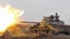 A Syrian tank in action near the Iraqi border.