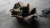 <p lang="be-BY">Сырыйскае дзіця ў склепе, які выкарыстоўваецца ў якасьці схованкі ад паветраных удараў, на ўскраіне Дамаску. 25 сакавіка 2018</p>
