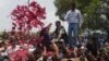 Pakistan Peoples Party (PPP) chairperson Bilawal Bhutto Zardari (C) waves to supporters at the start of his election campaign in the southern province of Sindh.