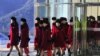 Уболівальниці з КНДР прибули на Олімпіаду в Південну Корею