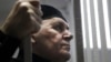 Чеченский правозащитник Оюб Титиев во время судебного процесса над ним, 18 марта 2019 года