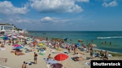 Bathers crowd a beach in Odesa.