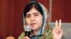 Pakistani education activist Malala Yousafzai gives a press conference after meeting with the Nigerian president in Abuja on July 14.