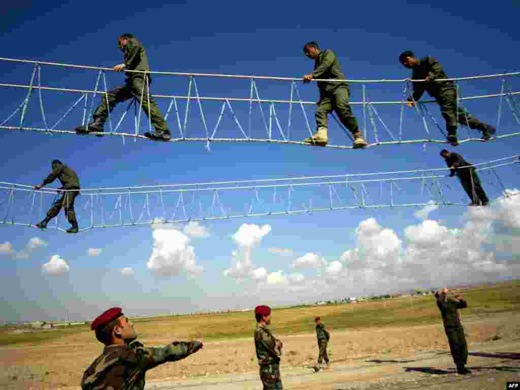 Kurdish peshmerga fighters train in the northern Iraqi city of Irbil on March 2. Photo by Safin Hamed for AFP