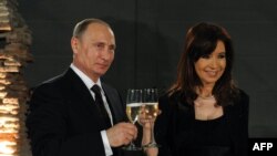 Russian President Vladimir Putin and Argentinian President Cristina Kirchner launched a Spanish-language RT channel in 2014.