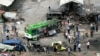 Последствия взрыва на автобусной остановке в городе Джабле между Латакией и Тартусом