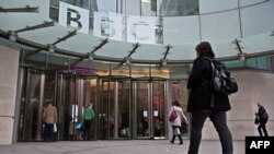 U.K. - BBC employees arrive for work at the organisation's New Broadcasting House in central London, 12Nov2012