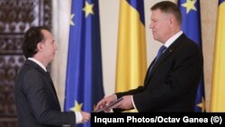 Romanian President Klaus Iohannis (right) and his latest nominee for prime minister, Florin Citu (file photo)