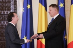 Klaus Iohannis și Florin Câțu