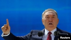 Kazakh President Nursultan Nazarbaev speaks as he attends celebrations on May 1 to mark Kazakhstan People's Unity Day in Almaty, an event that was marked by several protests despite bans on unsanctioned rallies. 