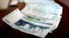 وزیر اقتصاد: تغییر واحد پولی از ریال به تومان «تدریجی» خواهد بود