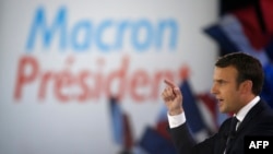 France -- French presidential election candidate for the En Marche ! movement, Emmanuel Macron delivers a speech during a campaign rally at the Paris Event Center in Paris, May 1, 2017