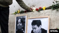 A memorial for murdered lawyer Stanislav Markelov and journalist Anastasia Baburova in Moscow