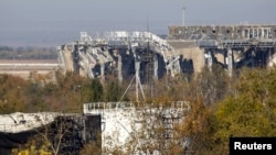 The damaged main terminal of the Donetsk Sergei Prokofiev International Airport is pictured during fighting between pro-Russian rebels and Ukrainian government forces in Donetsk on October 4.