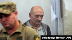 MH17 suspect Volodymyr Tsemakh sits in a courtroom in Kyiv on September 5.