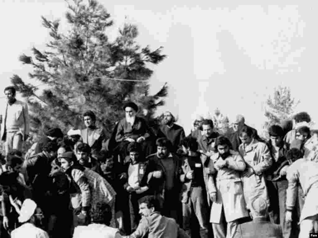 Khomeini gives his first speech at the Behesht Zahra cemetery after his return on February 1, 1979.