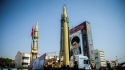 FILE PHOTO: A display featuring missiles and a portrait of Iran's Supreme Leader Ayatollah Ali Khamenei is seen at Baharestan Square in Tehran, Iran September 27, 2017