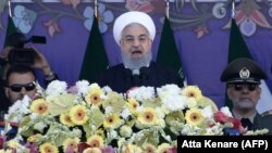 Iranian President Hassan Rohani delivers a speech during a parade on the occasion of the country's Army Day in Tehran on April 18.