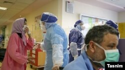 Iranian health workers say they urgently protective gear against coronavirus. FILE PHOTO