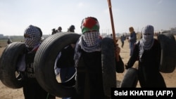 Акция протеста палестинцев на границе сектора Газа и Израиля, июль 2018 года.