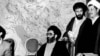 An undated photo probably from early1980s, showing Ali Khamenei (C) and Hashemi Rafsanjani (far R)