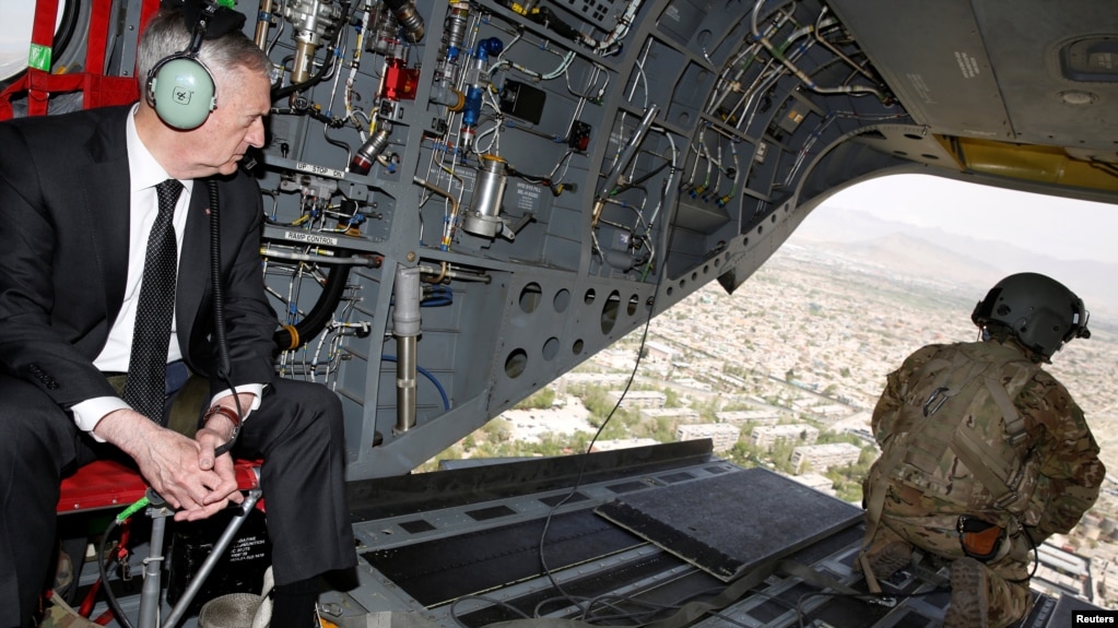 U.S. Defense Secretary James Mattis looks out over Kabul as he arrives via helicopter in Kabul on April 24.