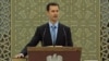 Башар Асад приносит клятву на церемонии в Дамаске 16 июля
