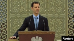 Присяга Башара Асада після обрання на черговий семирічний президентський термін, липень 2014 рік