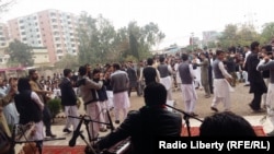 Afghan youth dancing to celebrate their team's victory over Zimbabwe on January 7.