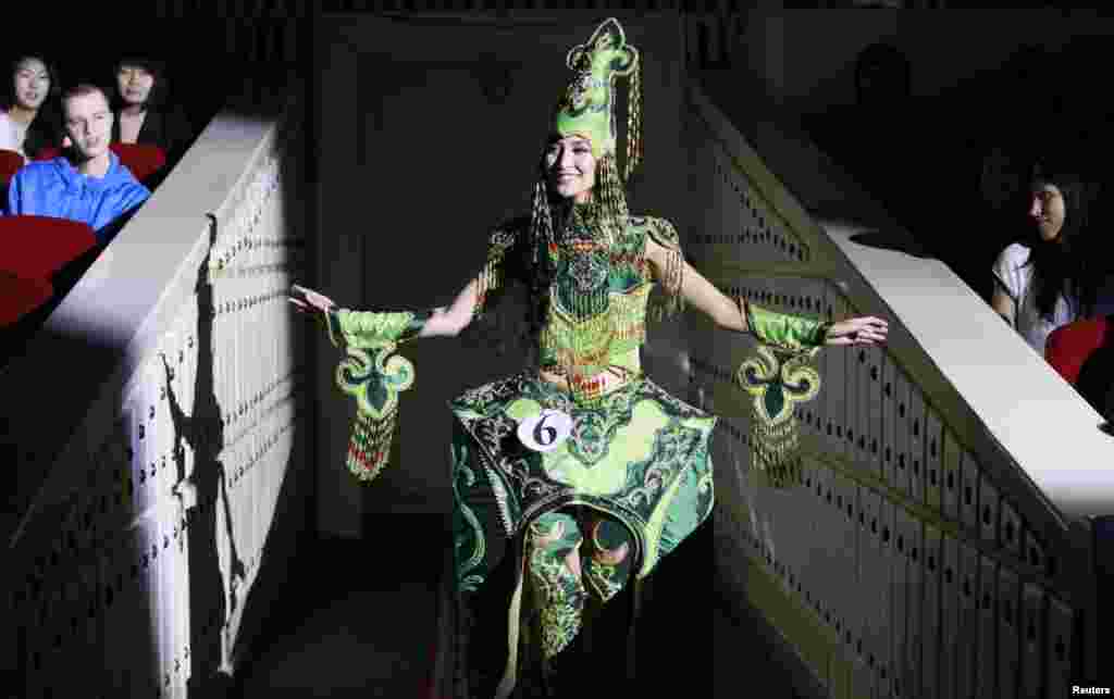 Lyudmila Popova, 18, of Russia's Sakha (Yakutia) Republic performs during the final show of the seventh Miss Asia-Siberia interregional amateur beauty and talent contest in the Siberian city of Krasnoyarsk. (Reuters/Ilya Naymushin)
