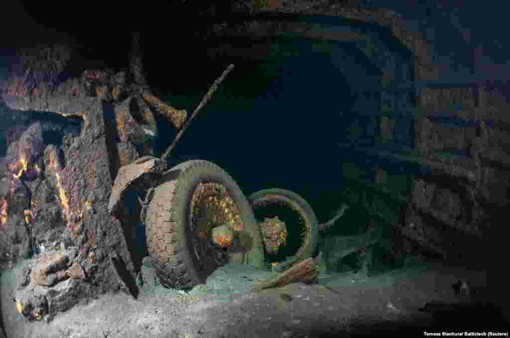 A photo taken inside the boat, which was reportedly sunk by Soviet warplanes. The Polish divers released a statement saying the ship was &quot;practically intact. In its holds we discovered military vehicles, porcelain, and many crates with contents still unknown.&quot; 