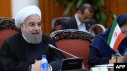 Iranian President Hassan Rohani speaks during talks with the Vietnamese prime minister in Hanoi on October 6.