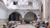 Madrasah students study at a mosque in Peshawar, Pakistan.