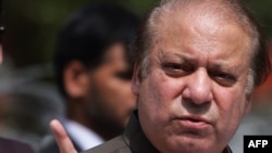 Pakistani Prime Minister Nawaz Sharif speaks to the media after appearing before an anticorruption panel in Islamabad on June 15.