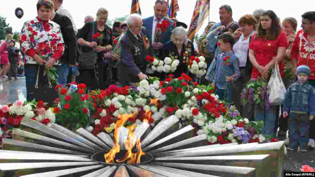 Veterans and relatives commemorate Victory Day in Chisinau, Moldova.