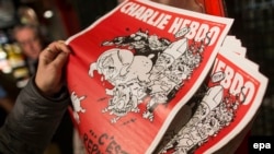 Французский сатирический журнал Charlie Hebdo. Иллюстративное фото.