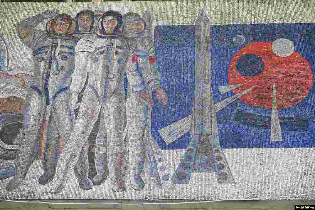 A mosaic above the entrance to the Frunzenskaya Metro station, in Moscow, celebrates science and the Soviet space program.