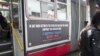 A city bus with a pro-Israel ad from the American Freedom Defense Initiative on it passes through downtown San Francisco.