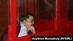 Ержан Утембаев, бывший руководитель аппарата сената парламента, осужденный по делу об убийстве Алтынбека Сарсенбаева. Алматинская область, 22 января 2014 года.
