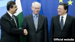 EU President Belgian Herman Van Rompuy (center) and Comission President Jose Manuel Barroso (right) greet Pakistani Prime Minister Yousaf Raza Gilani in Brussels.