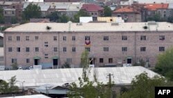 Armenia == A general view of Erebuni police station seized by gunmen and supporters of fringe jailed opposition leader Zhirair Sefilian, in Yerevan, July 30, 2013