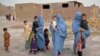 Familii afgane nevoite să-și părăsească casele din cauza războiului, august 2021. 