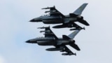 Винищувачі F-16 під час відзначення Дня Повітряних сил України. Київщина, 4 серпня 2024 року