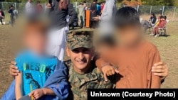 Sean Jamshidi is pictured during an operation to welcome evacuated Afghan children to the United States at a military base in Quantico, Virginia, in 2021.