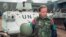 Then-U.S. Senator Joe Biden speaks to reporters in front of a Danish UN armored personnel carrier at the airport in Sarajevo on April 9, 1993.
