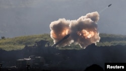 An Israeli artillery unit fires toward Lebanon amid escalation between Iran-backed Hezbollah and Israel. (file photo)