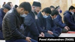 Muslims pray at a mosque in Dushanbe, Tajikistan.